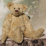 Sir Galahad is a very large, elegant and huggable, one of a kind, classical mohair artist teddy bear made by Barbara-Ann Bears Sir Galahad stands 24.5 inches/62 cm tall and is made from dense and wavy, golden German mohair with beige wool felt paw pads, large black boot button eyes, an impressive brown nose and the sweetest smile. 