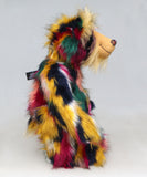 Syracuse standing in profile, Syracuse is a 19 inch one of a kind, artist bear by Barbara-Ann Bears in luxurious blonde mohair and beautifully colourful faux fur