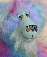 Syracuse's face. showing his beautiful hand painted eyes (with eyelids), wonderfully embroidered nose and sweet smile.
Syracuse is a large and beautifully coloured one of a kind artist bear by Barbara Ann Bears in luxurious multi-coloured fluffy faux fur and very long, turquoise mohair he stands 19 inches/48 cm tall