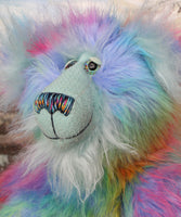 Syracuse's face. showing his beautiful hand painted eyes (with eyelids), wonderfully embroidered nose and sweet smile.
Syracuse is a large and beautifully coloured one of a kind artist bear by Barbara Ann Bears in luxurious multi-coloured fluffy faux fur and very long, turquoise mohair he stands 19 inches/48 cm tall