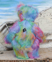 Syracuse standing, viewed from the back.
Syracuse is a large and beautifully coloured one of a kind artist bear by Barbara Ann Bears in luxurious multi-coloured fluffy faux fur and very long, turquoise mohair he stands 19 inches/48 cm tall