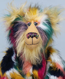 Syracuse's face showing his fluffy blonde beard, his hand painted glass eyes, multi coloured nose and sweet smile. Syracuse is a 19 inch one of a kind, artist bear by Barbara-Ann Bears in luxurious blonde mohair and beautifully colourful faux fur