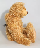 Teddington sitting in profile.
Teddington, a large, elegant and very huggable, one of a kind, classical, traditional mohair artist teddy bear made by Barbara-Ann Bears, he stands 21.5 inches (55cm) 