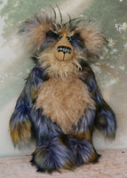 Walter Hugwurzel is a very shaggy, lovable and beautifully coloured, one of a kind, artist teddy bear in gorgeous faux fur & fluffy mohair by Barbara-Ann Bears, he stands 18.5 inches/47 cm tall.  He is made from a long faux fur in gold, black, silver and slate grey with a long creamy beige mohair, olive green faux fur with long black tufts, suedette paw pads and hand painted eyes with eyelids