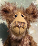 Wilbur has beautiful hand painted eyes, intricately embroidered nose and a huge smile, this is a close up of his face