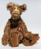 Wilbur is a magnificent and very handsome, one of a kind, artist teddy bear by Barbara-Ann Bears in gorgeous and luxurious mohairs, he stands 23 inches/ 59 cm tall. Wilbur is made from a very long wildly distressed mid brown mohair together with a very, very long (and expensive) tousled beige mohair with brown tipping. Here he is sitting facing the camera