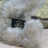 Wolfie has one of our early sew in labels with our first  Teddies by Barbara Ann Bears logo