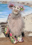 Amelie Papillion is an extremely beautiful, one of a kind artist bear by Barbara-Ann Bears, she stands 17.5 inches (44 cm) tall and is 12 inches (30 cm) sitting. Amelie Papillion is made from the most wonderful printed fabric, with areas of white, grey and pink and on top of this a myriad of fluttering butterflies