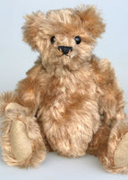 Angus is a very sweet and friendly artist teddy bear in gorgeous mohair by Barbara Ann Bears, he is 7.5 inches/19 cm tall and is 6 inches/15 cm sitting.  Angus is a wonderful traditional teddy bear, a bear we made in the early 1990s, he is made from a grey mohair that has very fine black threads running through it.  Angus has grey wool felt paw pads and gorgeous vintage boot buttons for eyes, he has a little, carefully embroidered black nose and a very relaxed and lovable expression. 