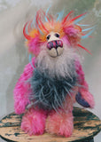 Anoushka Flambé a joyous celebration of colourful happiness, a one of a kind artist bear in hand dyed mohair & faux fur by Barbara-Ann Bears. Anoushka Flambé stands 10 inches( 25 cm) tall and is 7.5 inches ( 19 cm) sitting, this doesn't include her flaming hair which adds another 2.5 inches (7cm).