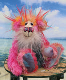 Anoushka Flambé a joyous celebration of colourful happiness, a one of a kind artist bear in hand dyed mohair & faux fur by Barbara-Ann Bears. Anoushka Flambé stands 10 inches( 25 cm) tall and is 7.5 inches ( 19 cm) sitting, this doesn't include her flaming hair which adds another 2.5 inches (7cm).