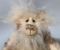 Arthur is an endearingly sweet one of a kind, artist bear by Barbara-Ann Bears in wonderfully fluffy mohair and faux fur. Arthur stands 8 inches (20 cm) tall and is 6 inches (15 cm) sitting. 