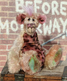 Astrid Plunkwaffle, a happy, wild and loveable, one of a kind, hand dyed mohair artist bear by Barbara-Ann Bears Astrid Plunkwaffle stands 10 inches (25 cm) tall and is 8 inches ( 20 cm) sitting, this doesn't include her beautiful mohawk which adds another 2.5 inches (6cm). Astrid Plunkwaffle is a sweetheart