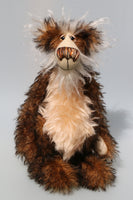 Baron Marcel von Crinklehoven is a comical yet handsome, one of a kind, artist bear by Barbara-Ann Bears in wonderful fluffy tipped mohair. Baron Marcel von Crinklehoven stands 15.5 inches(39 cm) tall and is 12 inches(31 cm) sitting. 