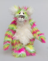 Bedivere a very sweet and gentle one of a kind, artist bear by Barbara-Ann Bears in gorgeous mohair and beautifully coloured stripy faux fur. He stands 17.5 inches (38 cm) tall and is 13 inches (30 cm) sitting. Bedivere is mostly made from a long faux fur with bands of bright magenta, grass green and lemony yellow