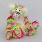 Bedivere a very sweet and gentle one of a kind, artist bear by Barbara-Ann Bears in gorgeous mohair and beautifully coloured stripy faux fur. He stands 17.5 inches (38 cm) tall and is 13 inches (30 cm) sitting. Bedivere is mostly made from a long faux fur with bands of bright magenta, grass green and lemony yellow