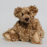 Bernard McFluff is a very old bear, he was one of our first designs going back to 1992. He is 12 inches/30cm tall and is 9 inches/23cm sitting Bernard McFluff is made from a beautiful, distressed, shaggy, soft brown English mohair, he was one of our first bears with a long snout and a big tummy
