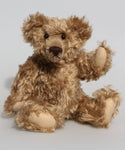 Bernard McFluff is a very old bear, he was one of our first designs going back to 1992. He is 12 inches/30cm tall and is 9 inches/23cm sitting Bernard McFluff is made from a beautiful, distressed, shaggy, soft brown English mohair, he was one of our first bears with a long snout and a big tummy