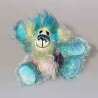 Bim-Bam is a very happy little teddy bear, a one of a kind artist bear by Barbara-Ann Bears in beautiful blue hand dyed mohair and faux fur.  Bim-Bam is quite a little bear, he stands just 5.5 inches/14 cm tall and is 4.5 inches/11 cm sitting. Bim-Bam wants to see you smiling and laughing, just to enjoyyour company. 