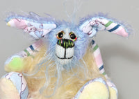 Bluebell has small hand painted glass eyes with hand coloured eyelids, a sweet, little nose sewn from individual threads to match her colouring and a beaming smile
