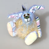 Bluebell is a small and sweet, one of a kind rabbit in beautifully coloured mohair and designer bunny fabric by Barbara Ann Bears, she stands just 5 inches/13 cm tall.  Bluebell is mostly made from a beautiful 'Peter Rabbit' cotton fabric with hand dyed blue and pale yellow mohair and hand dyed velvet paws. 