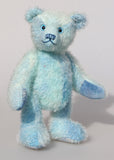 Bobby Daydream is a very handsome & subtly colourful, traditional, one of a kind artist teddy bear, in fabulous hand dyed mohair by Barbara Ann Bears, he stands 10 inches/25 cm tall and 7.5 inches/18 cm sitting. Bobby Daydream is made from a fairly short and sparse mohair, hand-dyed in natural blues, aqua and turquoise