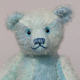 Bobby Daydream has glass eyes which were painted to match his mohair, a cute little nose carefully embroidered with individual threads to also match his colouring and a content and appealing expression.