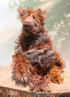 Boris Stroganov is a wild yet friendly, one of a kind, artist bear by Barbara-Ann Bears, he stands 19 inches(48 cm) tall and is 15 inches(38 cm) sitting.  He is made from long, wild and shaggy mohair that Barbara has hand-dyed in many beautiful hues of brown this is complemented by his long and very fluffy faux fur 