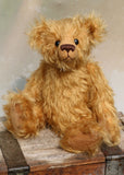 Braithwaite, a lovable slightly raggedy, one of a kind, traditional artist teddy bear made from beautiful German mohair by Barbara-Ann Bears. Braithwaite stands 11 inches (28cm) tall and is 8 inches (20cm) sitting. Braithwaite comes from the same design as we used to make Marigold's teddy bear for Downton Abbey