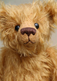 Braithwaite, a lovable slightly raggedy, one of a kind, traditional artist teddy bear made from beautiful German mohair by Barbara-Ann Bears. Braithwaite stands 11 inches (28cm) tall and is 8 inches (20cm) sitting. Braithwaite comes from the same design as we used to make Marigold's teddy bear for Downton Abbey