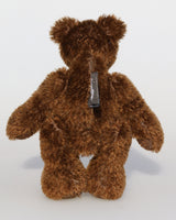 Bruce McCubbin is a very sweet and happy little brown mohair artist bear by Barbara Ann Bears, he stands just 6 inches( 15 cm) tall and is 4.5 inches (11 cm) sitting. Bruce McCubbin is made from a short, stubbly brown mohair, perfect mohair for a proper little bear, his paw pads are made from the same mohair trimmed  