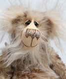 Calhoun is a charming and very friendly, one of a kind, artist bear by Barbara-Ann Bears in wonderfully fluffy tipped mohair and faux fur, he stands 11.5 inches(29 cm) tall and is 8.5 inches (21 cm) sitting. 