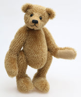 Cecil is a gorgeous little one of a kind traditional teddy bear made from beautiful antique gold mohair by Barbara Ann Bears. Cecil is 8 inches (20cm) tall and is 6 inches (15cm) sitting.