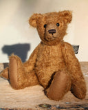 Charleston is a charming, traditional one of a kind artist bear in German mohair by Barbara Ann Bears, he stands 10 inches/27 cm tall and is 7.5 inches/22 cm sitting. Ambrose is made from wildly distressed, 'proper brown' German mohair, he has matching brown, wool-felt paw pads and vintage boot buttons for eyes