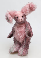 Clover Blossom is a very sweet and gentle, one of a kind rabbit in beautifully coloured mohair by Barbara Ann Bears Clover Blossom stands 9.5 inches( 24 cm) tall and is 7 inches (18cm) sitting, her ears are 8.5 inches (22 cm) across the top. Clover Blossom is a little sweetie, a beautifully coloured rabbit with a heart of gold.