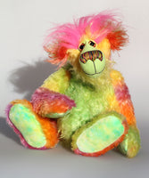 Cora B.Limey is wildly colourful and happy, one of a kind, hand dyed mohair, artist bear by Barbara-Ann Bears, a bear of tropical exuberance Cora B.Limey stands 14.5 inches( 37 cm) tall and is 11.5 inches (29 cm) sitting, this doesn't include her shock of hair which adds another 3 inches (7.5 cm) to those figures. 