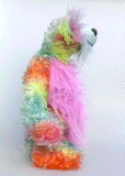 Cosmo is a gorgeous and gloriously colourful one of a kind artist bear in stunning hand dyed mohair and faux fur by Barbara-Ann Bears, she stands 16.5 inches( 42 cm) tall and is 12 inches ( 30 cm) sitting. Cosmo is mostly made from a long, wild mohair in colourful bands of blue, green, orange, gold, magenta and lime
