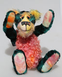 Darcy Dingle is a wild and wonderful bear, full of colourful happiness, a one of a kind, mohair artist teddy bear by Barbara-Ann Bears Darcy Dingle stands 10 inches( 25 cm) tall and is 8 inches ( 20 cm) sitting.