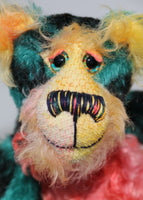 Darcy Dingle has beautiful, hand painted glass eyes with hand coloured eyelids, a splendid nose embroidered from individual threads to compliment his colouring and he has a huge, friendly smile. Darcy Dingle is the happiest of teddy bears, a bear who wants to brighten every dark corner and bring smiles and laughter wherever he goes