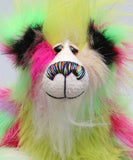 Dazzling Dave is a flamboyant fun-loving and comical, one of a kind, artist bear by Barbara-Ann Bears, he stands 13 inches/33 cm tall and is 10.5 inches/27 cm sitting. He is made of bright lime, pink, yellow and lavender faux fur, with lime paw pads, hand painted eyes, a beautiful multi coloured nose and a sweet smile