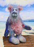 Delilah Dingles is mostly made from a medium length, sparse, quite straight mohair that Barbara has dyed in several gentle shades of blue with small splashes of pink, violet and green. Her tummy, the fronts of her ears and the underside of her tail are a longer, distressed soft pink mohair and her face is a very long, soft and wispy pale blue mohair. Delilah's hand dyed velvet paw pads coordinate very well with her main colours.