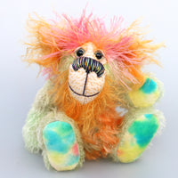 Diddy Gumdrops is a wonderfully happy, colourful and exuberant one of a kind, hand dyed mohair artist bear by Barbara-Ann Bears, he stands 7 inches( 18 cm) tall and is 5.5 inches ( 14 cm) sitting  Diddy Gumdrops might be small but he has a huge personality, he isn't a bear who takes himself too seriously