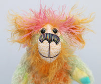Diddy Gumdrops has beautiful, big, hand painted eyes with eyelids, a splendid nose embroidered from individual threads to compliment his colouring and he has a huge, friendly smile.