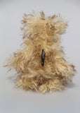 Dinsdale is a very scruffy, cute and quite little one of a kind artist bear in wonderfully shaggy tipped mohair by Barbara-Ann Bears Dinsdale stands just 7 inches (18 cm) tall and is 5 inches (13 cm) sitting. Dinsdale is a wild and shaggy chap made from the most wonderful, shaggy and feathery, brown tipped beige mohair