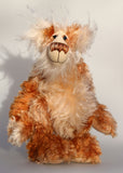 Donaghue, a very handsome and cuddly, beautifully coloured, one of a kind, teddy bear by Barbara-Ann Bears in wonderful batik mohair, Donaghue stands 14 inches (35.5 cm) tall and is 10.5 inches (27 cm) sitting. 