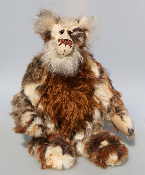 Pepe La Peluche is a big, stunning, wild and wonderful, one of a kind, artist teddy bear in gorgeous faux fur & mohair by Barbara-Ann Bears. Pepe La Peluche stands 18 inches (46 cm) tall and is 14.5 inches (37 cm) sitting. 