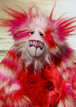 Ethel Snugglepuss, is a very sweet and gentle, one of a kind, artist bear by Barbara-Ann Bears in gorgeous mohair and beautiful faux fur.  Ethel stands 17.5 inches (38 cm) tall and is 13 inches (30 cm) sitting and is made from soft stripy faux pink, red and cream faux fur and long fluffy cream and red mohair.