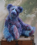 Ezra is an elegant, charming and handsome, one of a kind, artist bear by Barbara-Ann Bears in wonderful hand-dyed mohair like twilight. Ezra stands 16 inches (41 cm) tall and is 12 inches (30 cm) sitting. Ezra is a very handsome bear, made from the most beautiful mohair and with a twinkle in his eye 