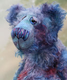 Ezra is an elegant, charming and handsome, one of a kind, artist bear by Barbara-Ann Bears in wonderful hand-dyed mohair like twilight. Ezra stands 16 inches (41 cm) tall and is 12 inches (30 cm) sitting. Ezra is a very handsome bear, made from the most beautiful mohair and with a twinkle in his eye 