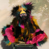 Fabian Funtuttle is an exotic and colourful, one of a kind, artist bear by Barbara-Ann Bears in luxurious mohair and rather wild faux fur Fabian Funtuttle stands 16 inches (40 cm) tall and is 12 inches (30 cm) sitting. Fabian Funtuttle is a rather wild and playful chap, a teddy bear for those who like colour and fun!